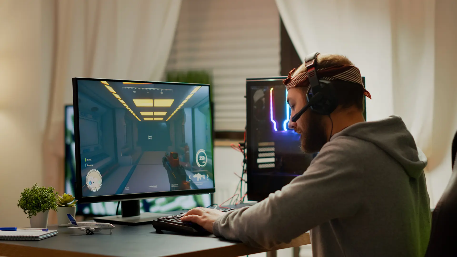 Young gamer wearing headset playing a 3D first-person shooter on a PC, highlighting the shift to polygonal game design